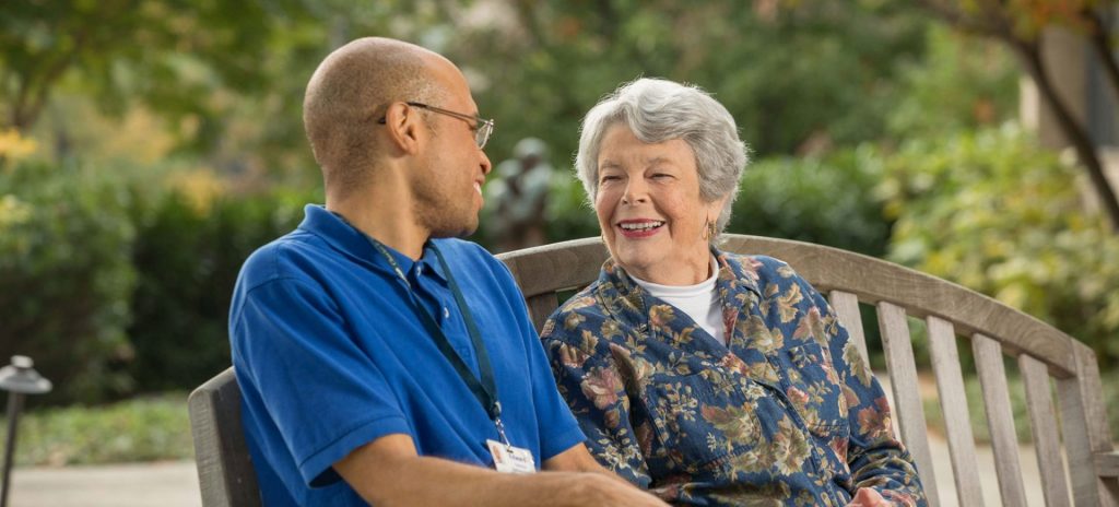 Resident with Charles E Smith Staff Member