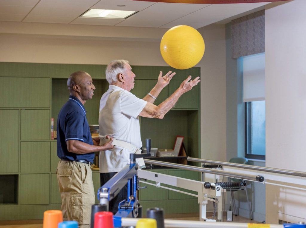 Therapist working with resident