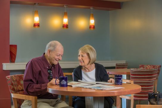 Senior couple dining at Charles E. Smith Life Communities