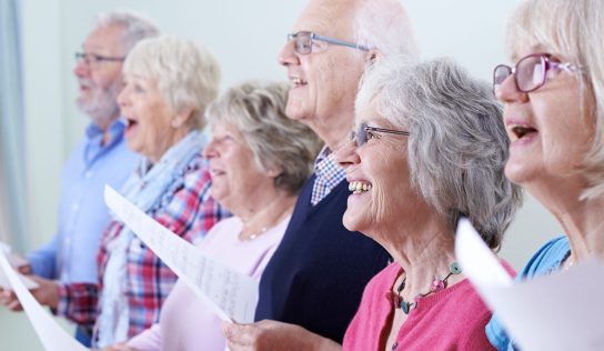 A group of seniors singing.