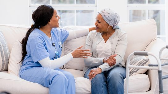 Nurse meets with her physical therapy patient